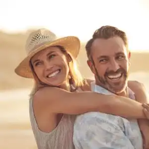 A couple embracing their youthful skin after a botox treatment at the Remington Laser Dermatology Centre, an advanced skin care and medispa clinic in Calgary.